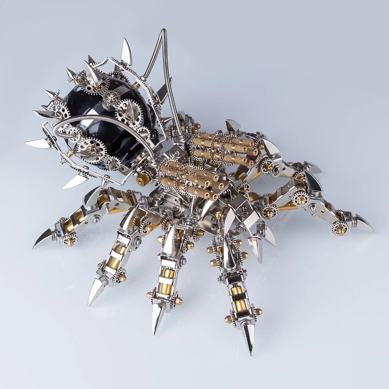 Mechanical metal tarantula model kit with a built in Bluetooth speaker and movable legs, a steel desk centerpiece Tarantula