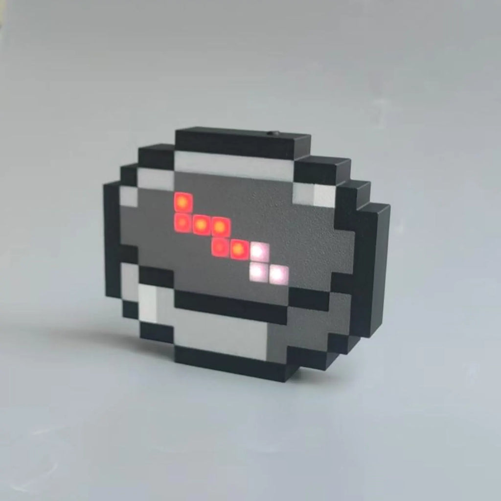Minecraft pixel compass replica for gaming setup decor with USB-C charging and a glowing in-game style needle