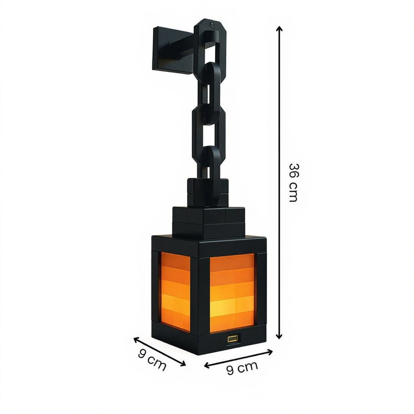 Black wall-mounted lantern with orange glass, showing dimensions on a white background