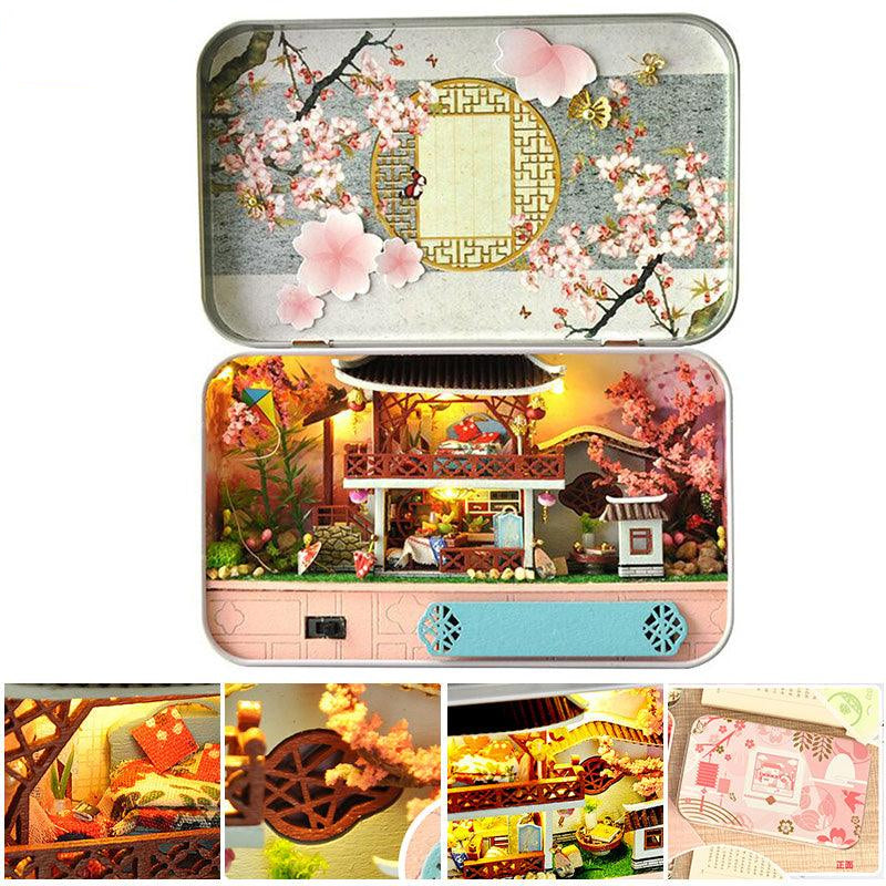 Spring cherry blossom miniature dollhouse kit with LED lighting and a built in music box, an illuminated 1:24 wooden desk scene Spring