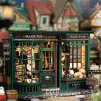 Miniature magic shop DIY building kit assembled as a lit 1:24 scale wizard potion shop, a booknook display for adult crafters