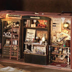 Fantasy booknook tucked on a bookshelf between real books, a dark academia miniature magic shop model for shelf and room decor