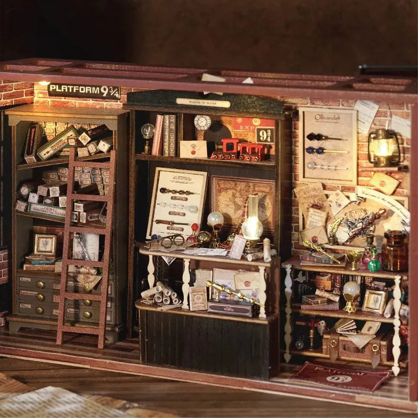 Fantasy booknook tucked on a bookshelf between real books, a dark academia miniature magic shop model for shelf and room decor