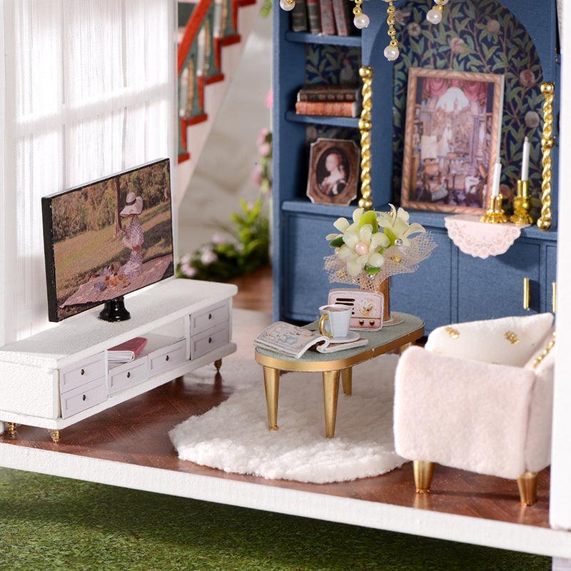 Warm LED lighting gives this impressionist garden model a soft gallery glow for a calming living room accent