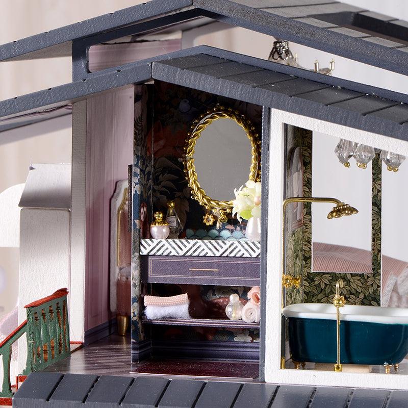 Finished garden model with a protective dust cover, a collectible desk and shelf display for art studios