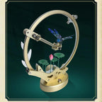 Dragonfly metal sculpture kit displayed as a kinetic shelf centerpiece, motorized moving model and home decor gift idea