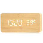 Bamboo wood LED alarm clock with tap and clap sound activation and a temperature readout for a calm bedroom nightstand
