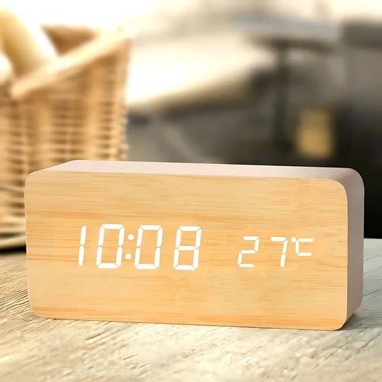 Bamboo wood digital clock with three programmable alarms and adjustable brightness, a warm LED desk clock for a home office