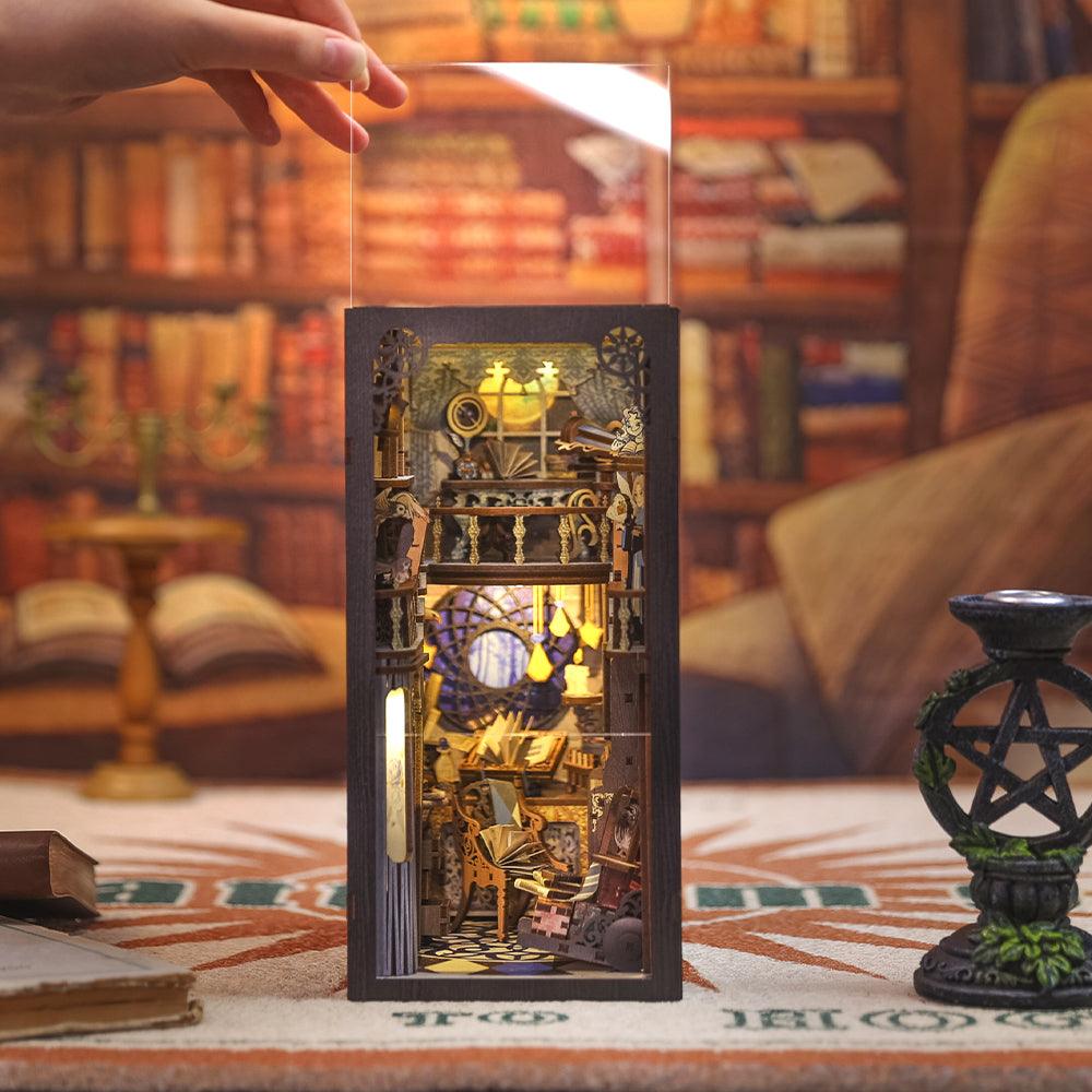 Nebula bookshelf diorama with an included dust cover that keeps the finished book nook clean for long term display