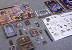 DIY book nook kit parts and color coded instructions laid out for a hands on space craft project for adult hobbyists