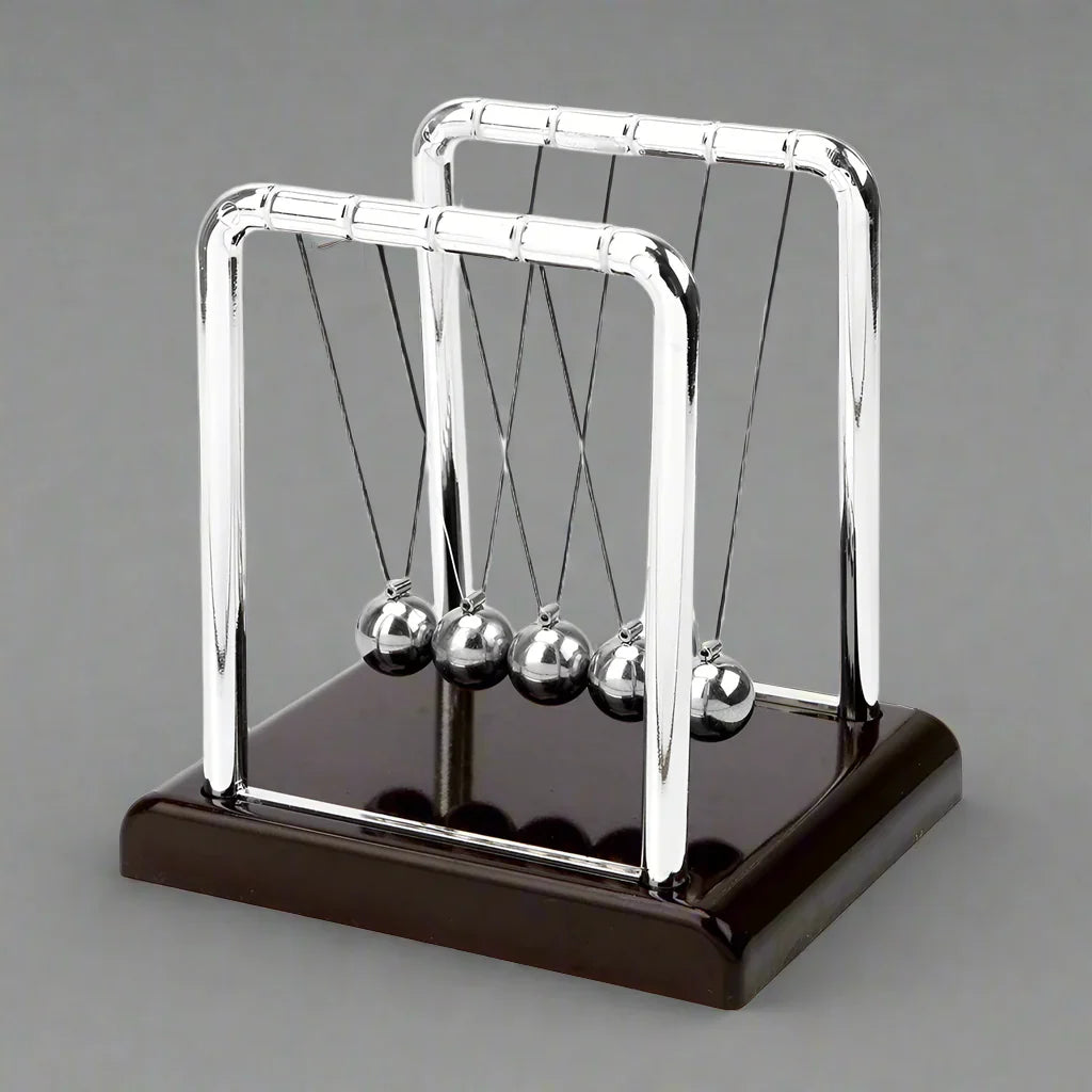 Newton's cradle with a red wood base and chrome arms as a sleek desktop kinetic ornament and momentum demonstrator (fits SKU_1748792312012_64)