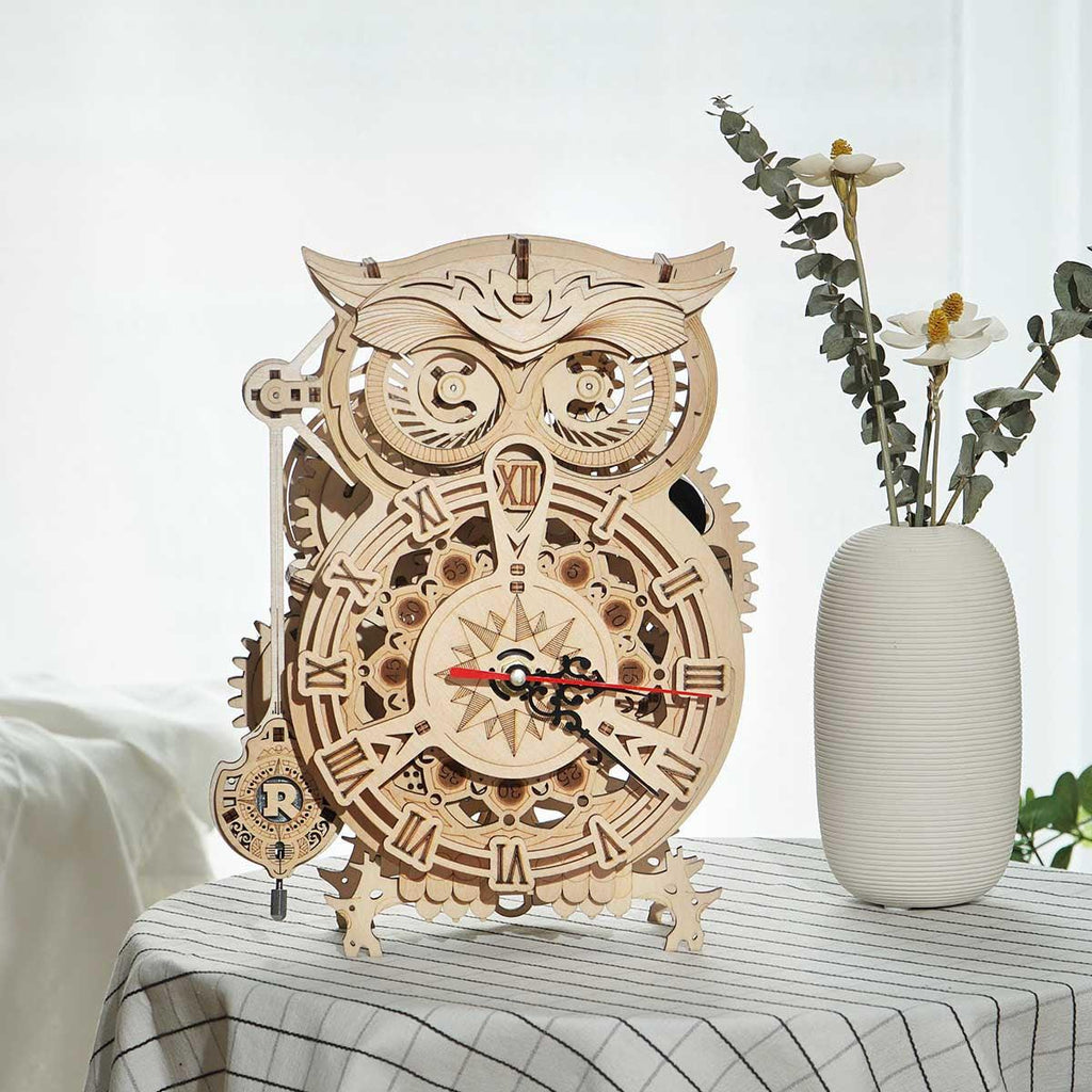 Owl shaped wooden pendulum clock as tabletop and nightstand decor, a handmade clockmaking gift for hobbyists and collectors