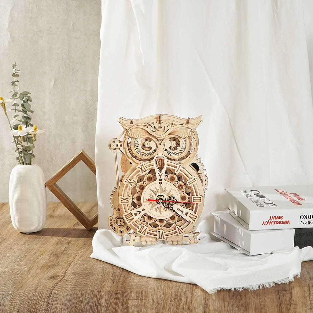 Mechanical owl timer clock with a spring bell for a study or office desk, a 3D wooden model kit and gift for clock collectors