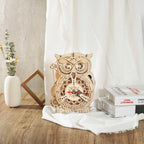 Mechanical owl timer clock with a spring bell for a study or office desk, a 3D wooden model kit and gift for clock collectors