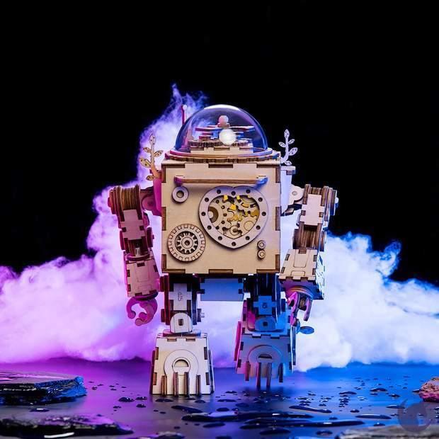 Steampunk robot music box as glowing shelf decor, a romantic anniversary gift for music and model kit fans
