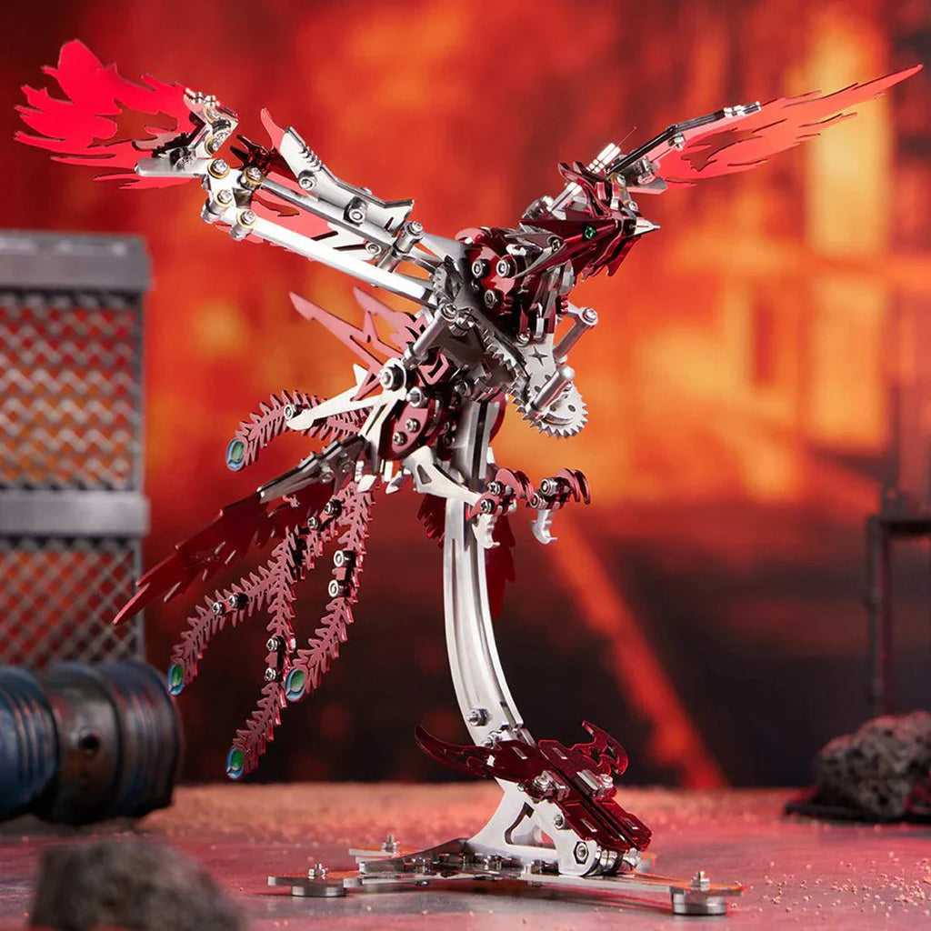 Mechanical phoenix model kit built from 358 precision cut stainless steel pieces, an interactive kinetic sculpture for a desk Red