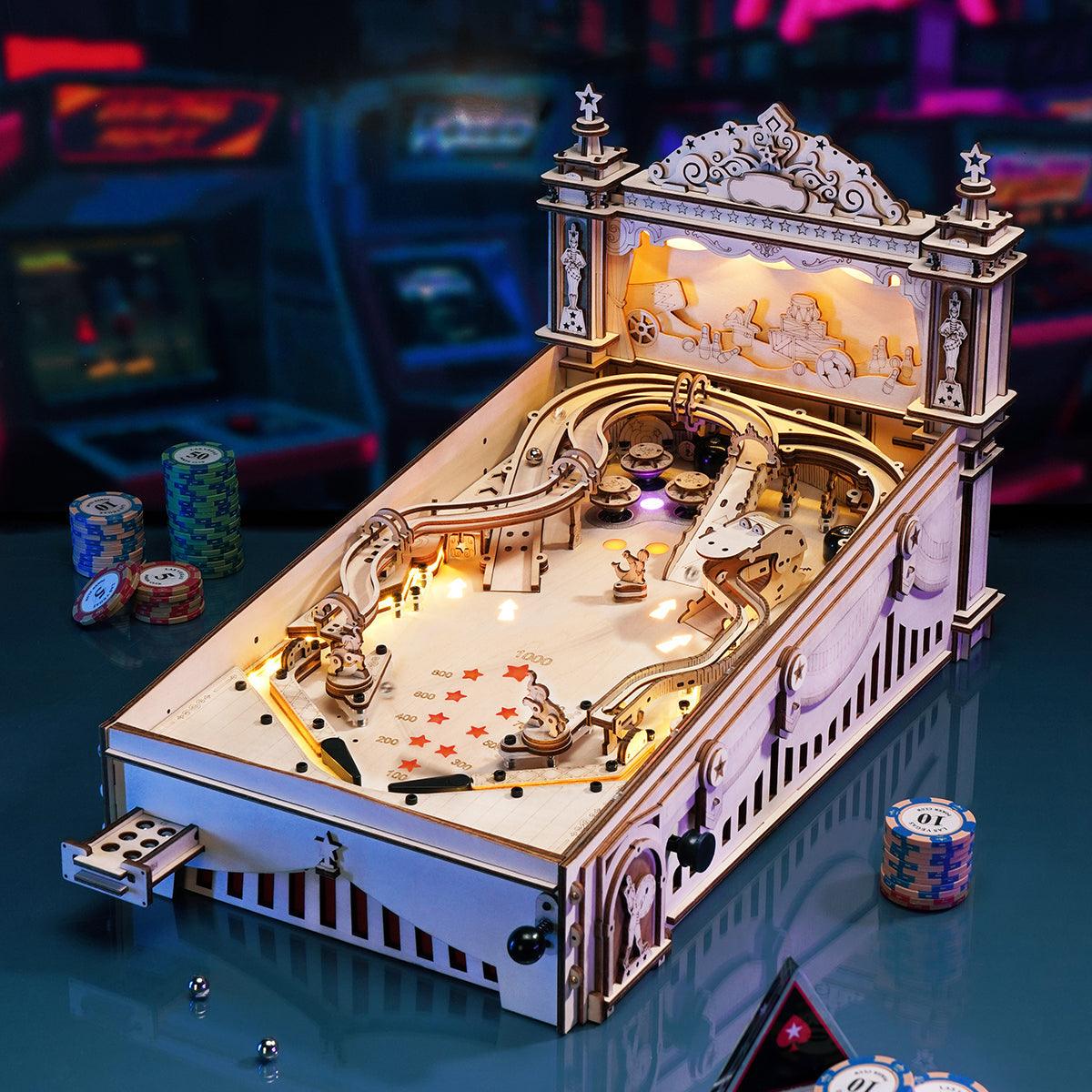 Over 300 laser cut wooden pieces joined by mortise and tenon joints to build a mechanical pinball machine model