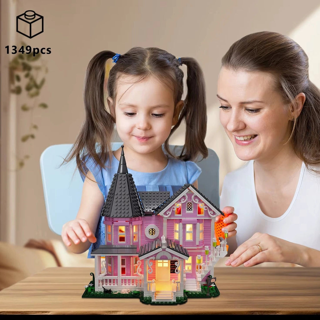 Pink Palace haunted house building set as a hands on family project and gift, a 1349 piece Victorian mansion to build together