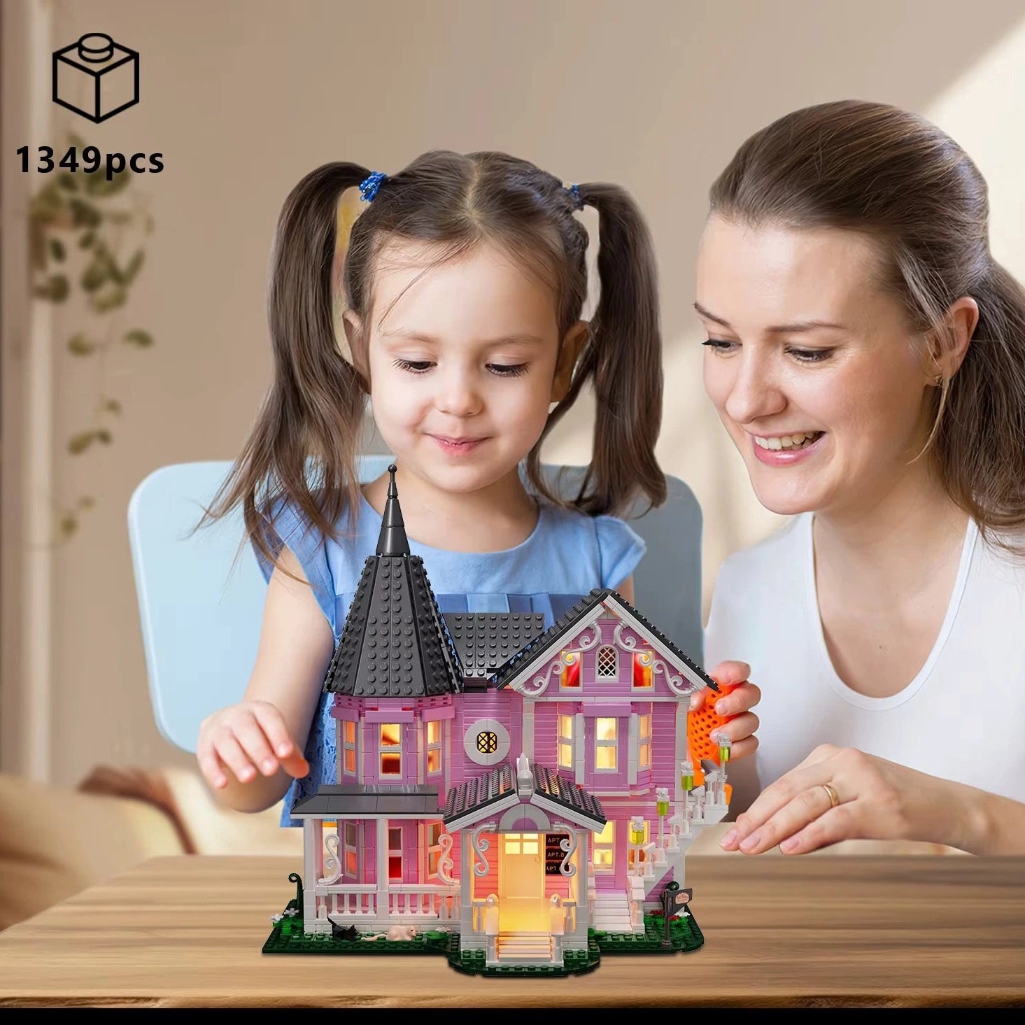 Pink Palace haunted house building set as a hands on family project and gift, a 1349 piece Victorian mansion to build together