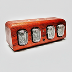 Four digit nixie tube clock with a bright warm amber time display and a wood base for a vintage desk or shelf Black Walnut with Copper Legs