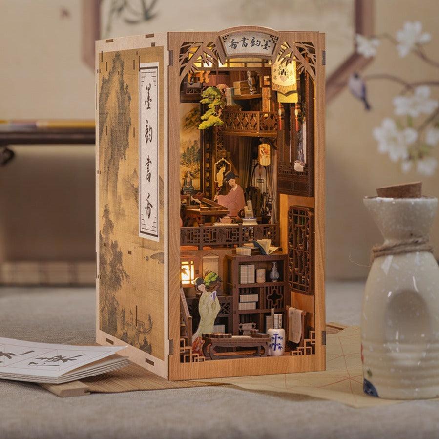 Lamplit miniature Chinese scholar study book nook kit with antique shelves and ink painting for a bookshelf