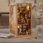 Lamplit miniature Chinese scholar study book nook kit with antique shelves and ink painting for a bookshelf