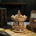 Assembled romantic carousel music box with a wind up merry go round that plays a tune, a wooden display piece for home decor