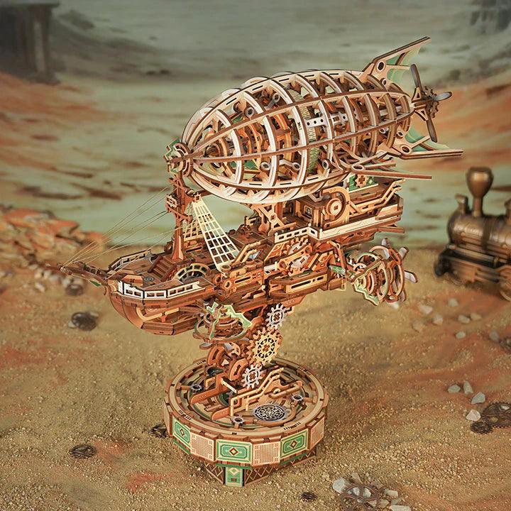 Sailing In Fog nautical airship model in a rugged frontier setting, a detailed wooden blimp for adult shelf decor