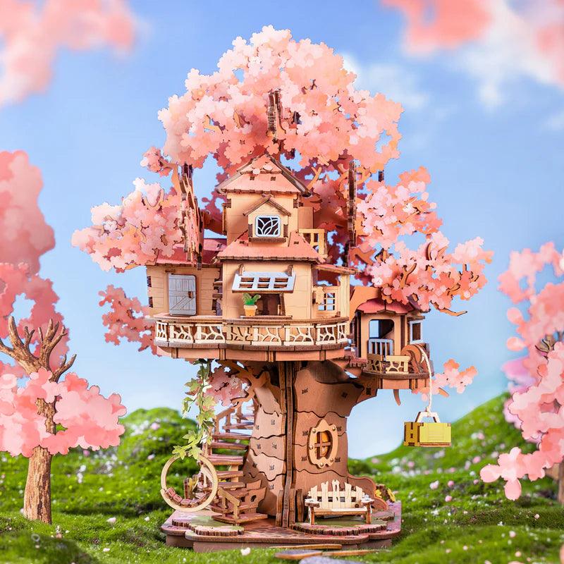 535 laser-cut basswood pieces that build a two-story cherry blossom treehouse, an intermediate wooden model kit for adults