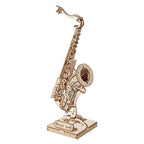 Wooden saxophone 3D puzzle kit built into a display model on a stand, desk decor and gift for music lovers