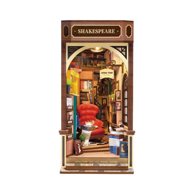 Shakespeare bookstore book nook kit that builds a lit Tudor bookshop between your books, a warm LED literary diorama
