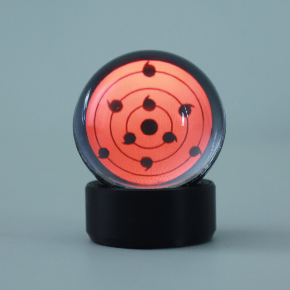 Glowing crystal ball speaker doubling as anime room decor and ambient light for a bedroom, office, or gaming setup