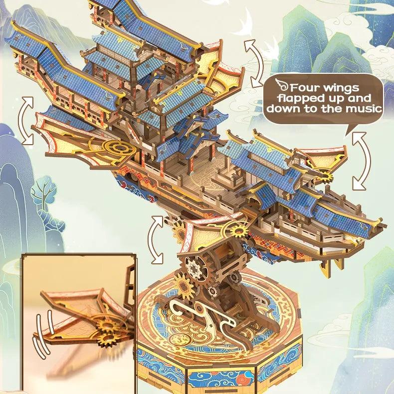 Sky Voyager mechanical airship puzzle with four wing platforms that flap to the music box melody, moving desk decor