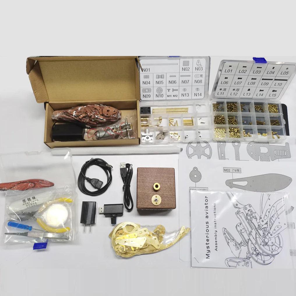 Laser cut brass and stainless steel aircraft model kit with motorized wing movement for aviation hobby enthusiasts