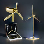 Solar windmill assembly kit with tower, base and turbine blades that build a gold kinetic desk model