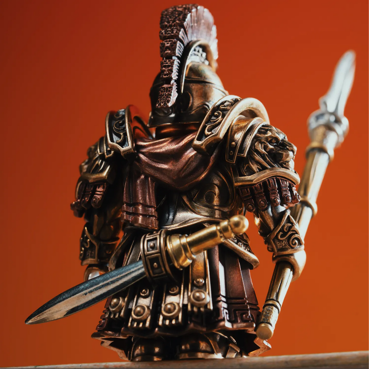 Bronze Spartan warrior figurine with a layered cape and lion pauldron holding the Spartan Spear, a detailed hoplite statue SPARTAN-FIGURINE-2