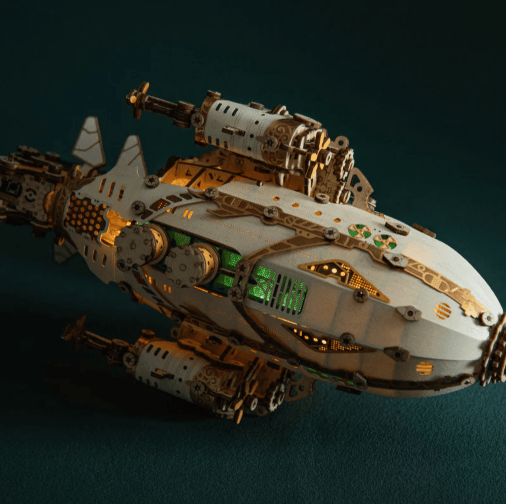 LED lit steampunk airship model that glows from within through paper panels, a mechanical wooden puzzle for hobbyists White