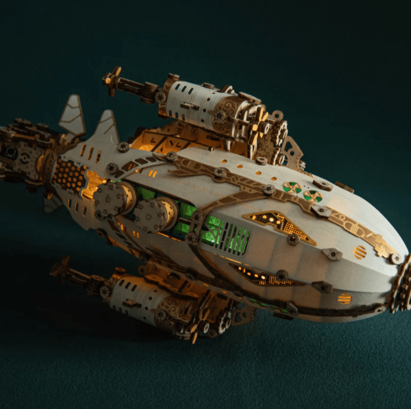LED lit steampunk airship model that glows from within through paper panels, a mechanical wooden puzzle for hobbyists White