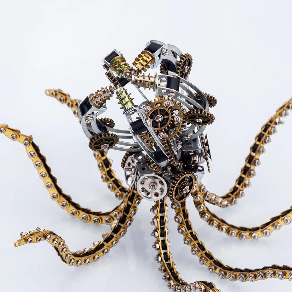 Poseable metal octopus with high mobility tentacles, a steampunk mechanical model and lit desk lamp for enthusiasts