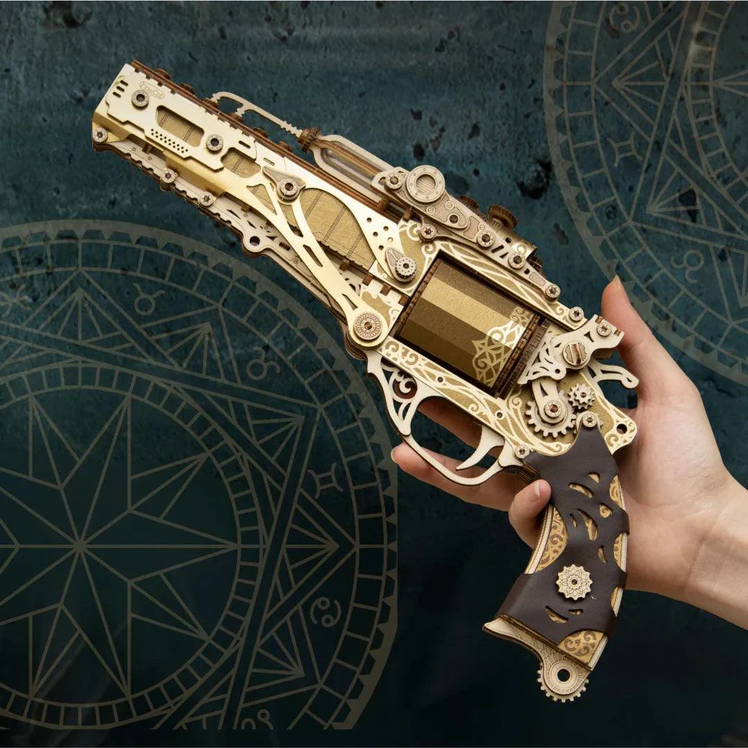 Gold wooden revolver puzzle with a dark carved grip, a mechanical gun model kit and collector display for adult builders Fantasy Luxury