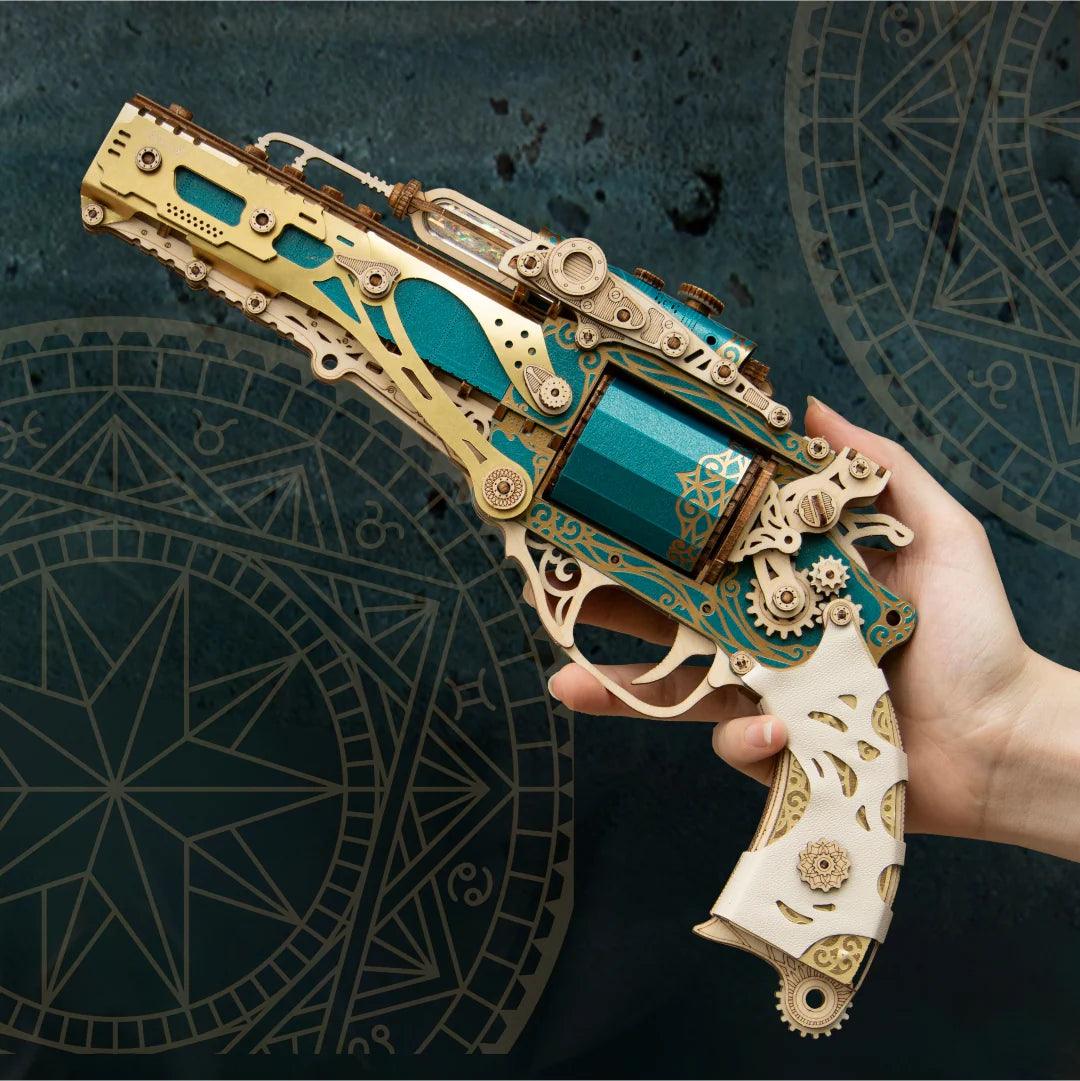 Hand held wooden revolver model in teal and gold, a snap fit 176 piece gun puzzle for adult hobby builders and collectors Palace Retro