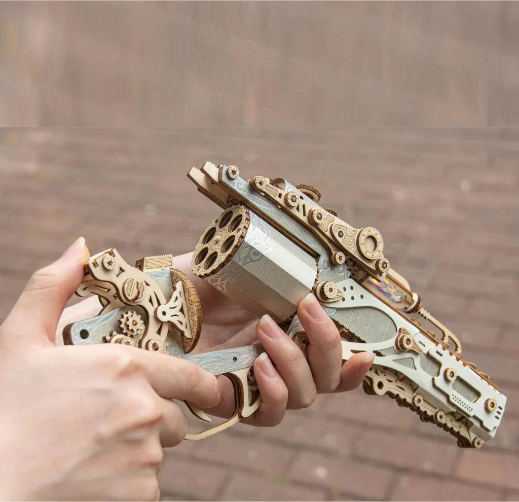 Steampunk pistol puzzle in silver wood, a hands on mechanical gun model kit with a revolving cylinder for adult collectors Steampunk