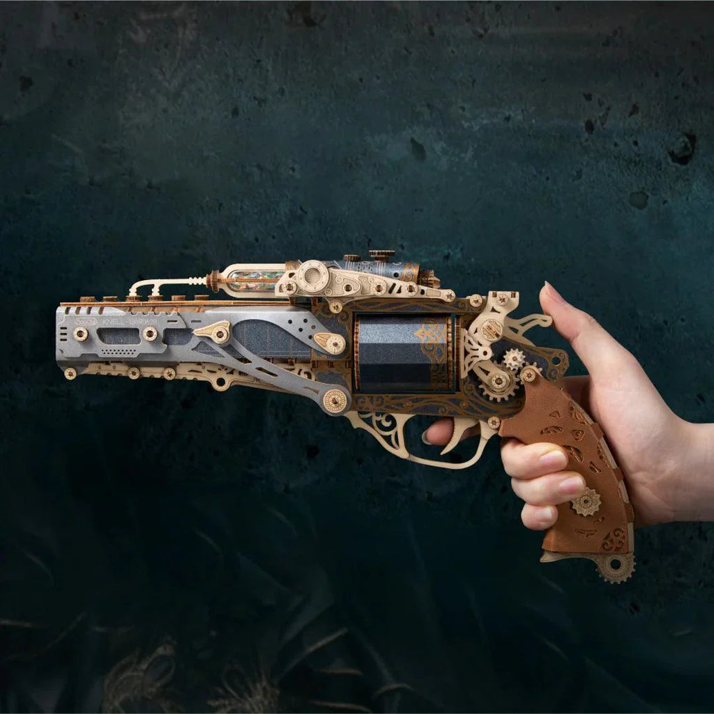Steampunk wood gun model in silver and tan, a hand held mechanical revolver puzzle with gears for adult model collectors Steampunk