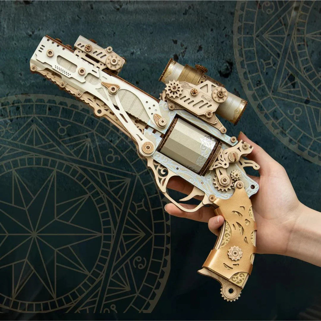 Wooden pistol puzzle with a carved grip and gold cylinder, a no glue snap fit revolver model kit and gift for hobby builders Victorian Elegance