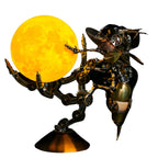 Steampunk wasp 3D metal model kit built from 627 stainless steel pieces on a glowing Jupiter light base for desk decor