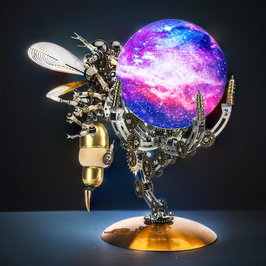 Mechanical metal centerpiece for a desk or shelf, an assembled steampunk wasp on the illuminated Jupiter light base