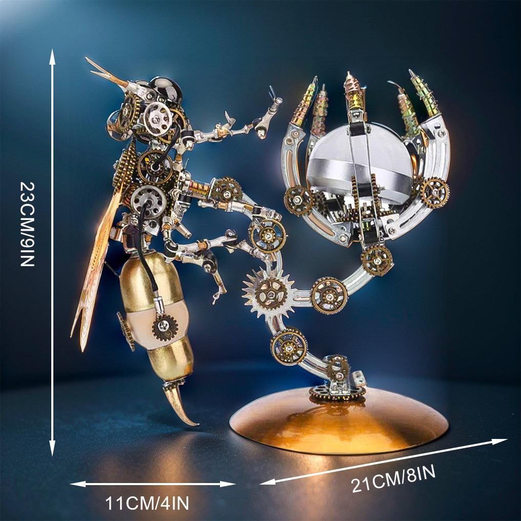 Steampunk metal wasp displayed in a garden scene as an illuminated tabletop centerpiece, offered with the Moon light base