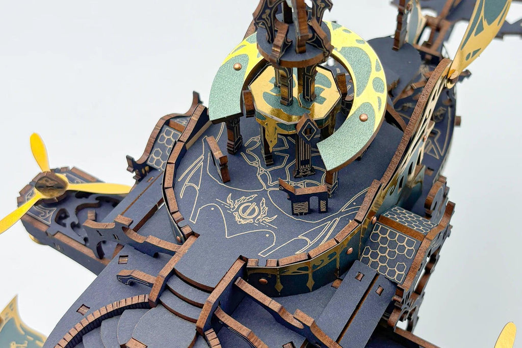 Illuminated deck detail of the birch ship puzzle with foil filigree, an LED model kit for desk and shelf display Blue