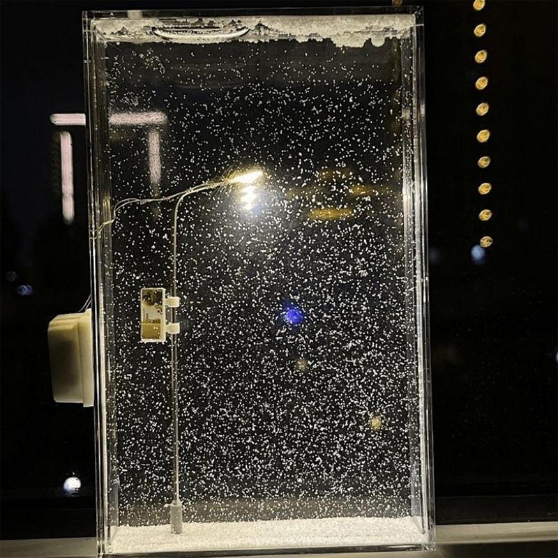Glowing street light snow scene night light kit with a lit miniature streetlamp and swirling snow for cozy desk lighting