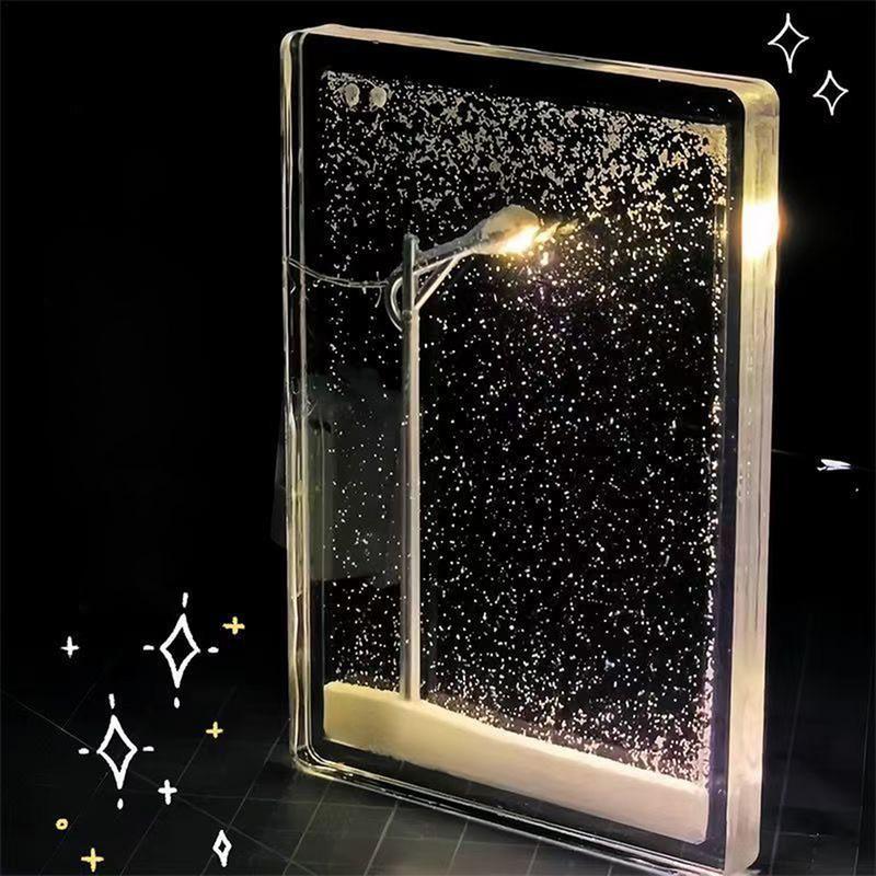 Winter snow globe streetlamp with drifting snowflakes and a warm LED glow, a calming bedside night light for bedrooms